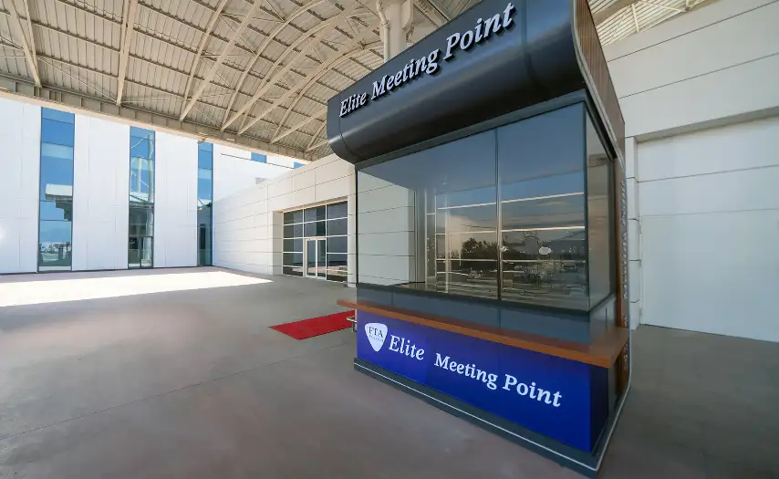 Meeting at the entrance to the terminal at the "CIP Meeting Point" counter.